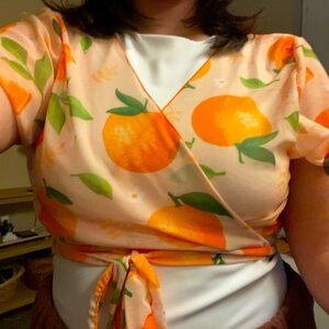 Orange print mesh wrap top